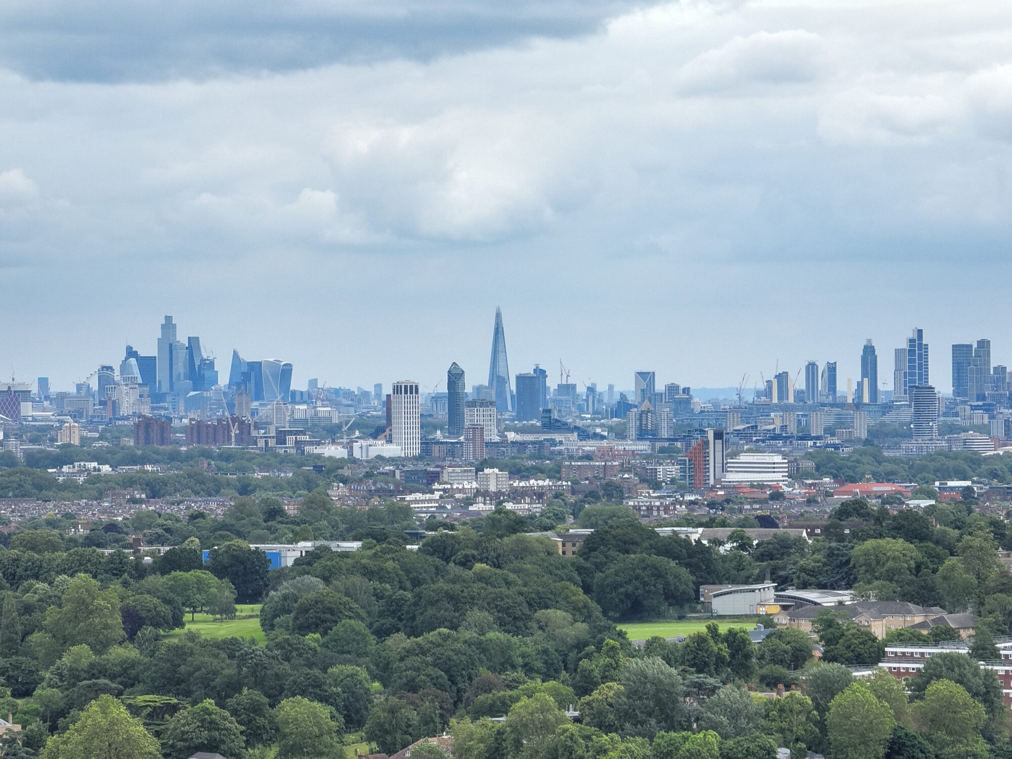 Skyline drone image of the shard, and city of London.