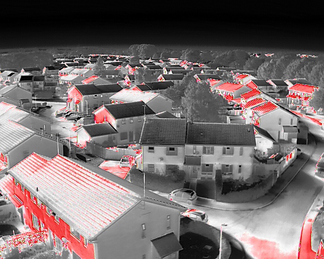 Thermal IR image of "red" hot building aspects at sunset.