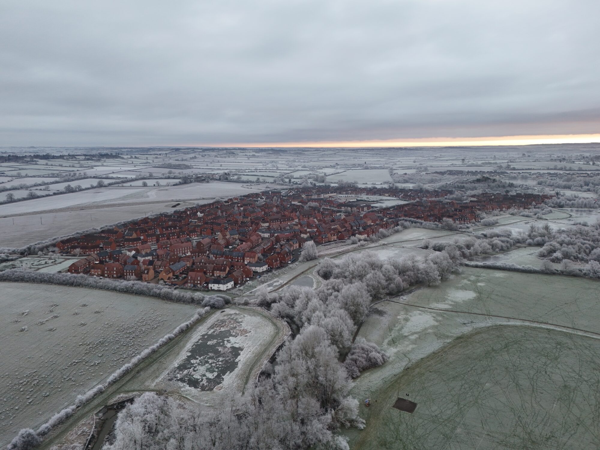 12 January 2025 drone imagery of frost covered ground around Buckingham Park, Aylesbury.