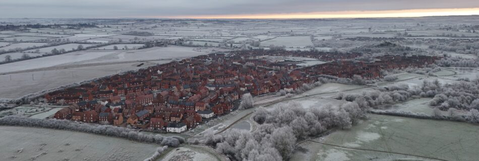 12 January 2025 drone imagery of frost covered ground around Buckingham Park, Aylesbury.