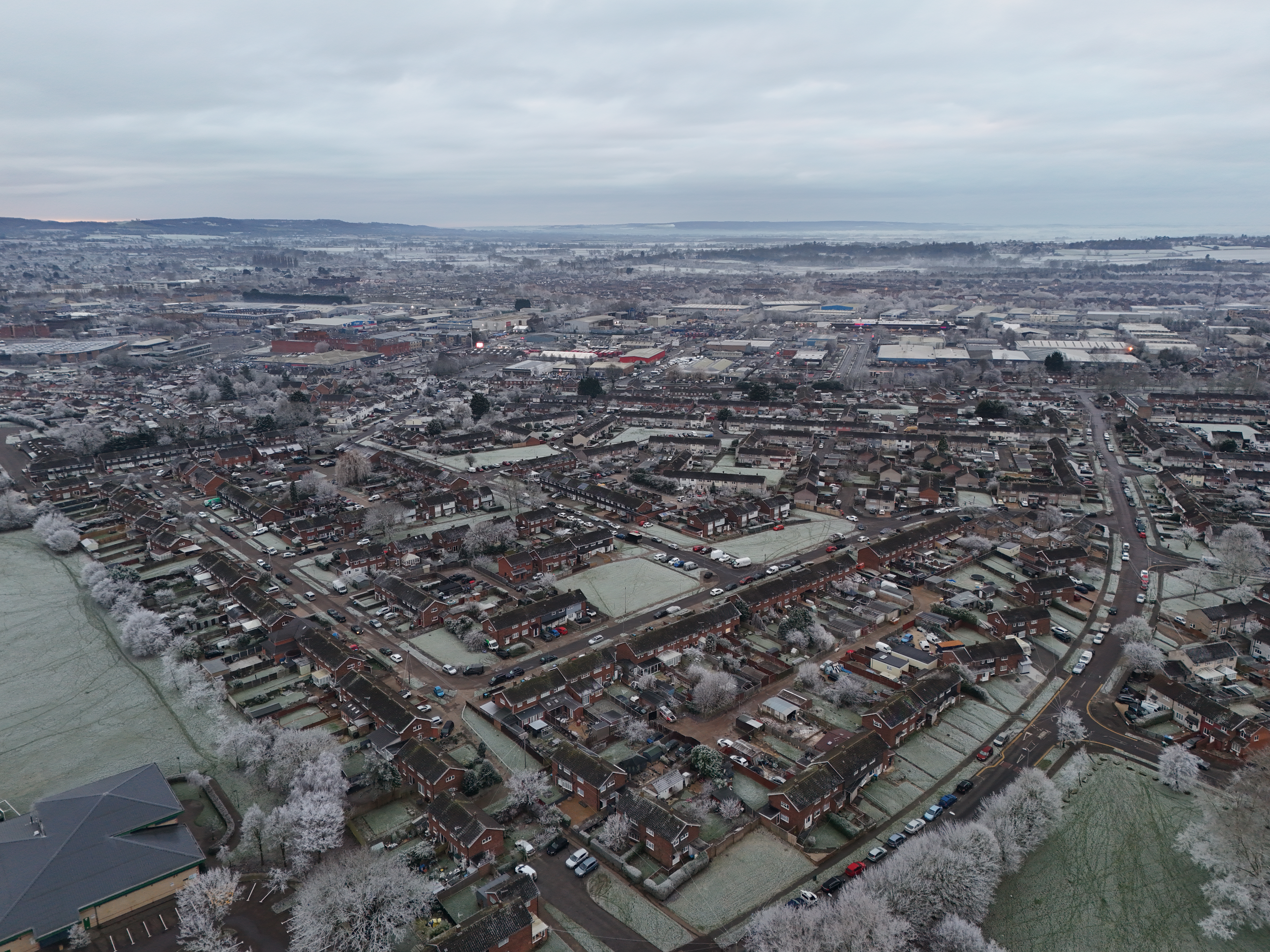 12 January 2025 drone imagery of frost covered ground around Meadowcroft, Aylesbury, facing towards Broadfields.