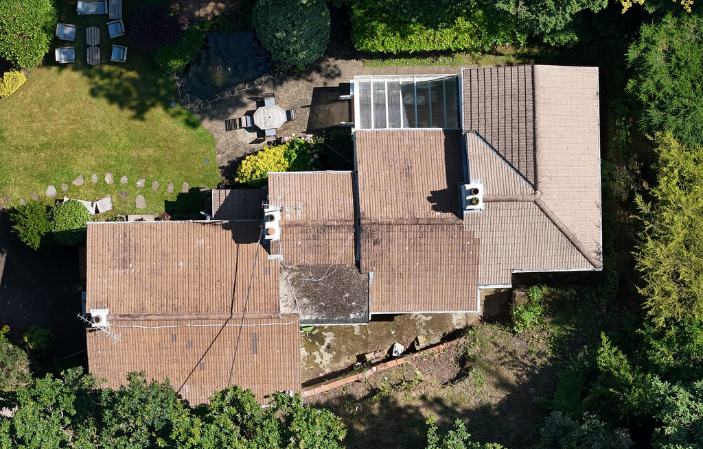 Overhead drone imagery of a residential home.