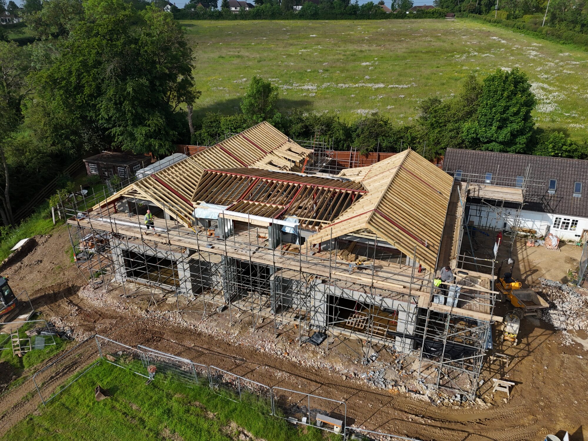 Monitor the progress of a construction project with drone imagery.