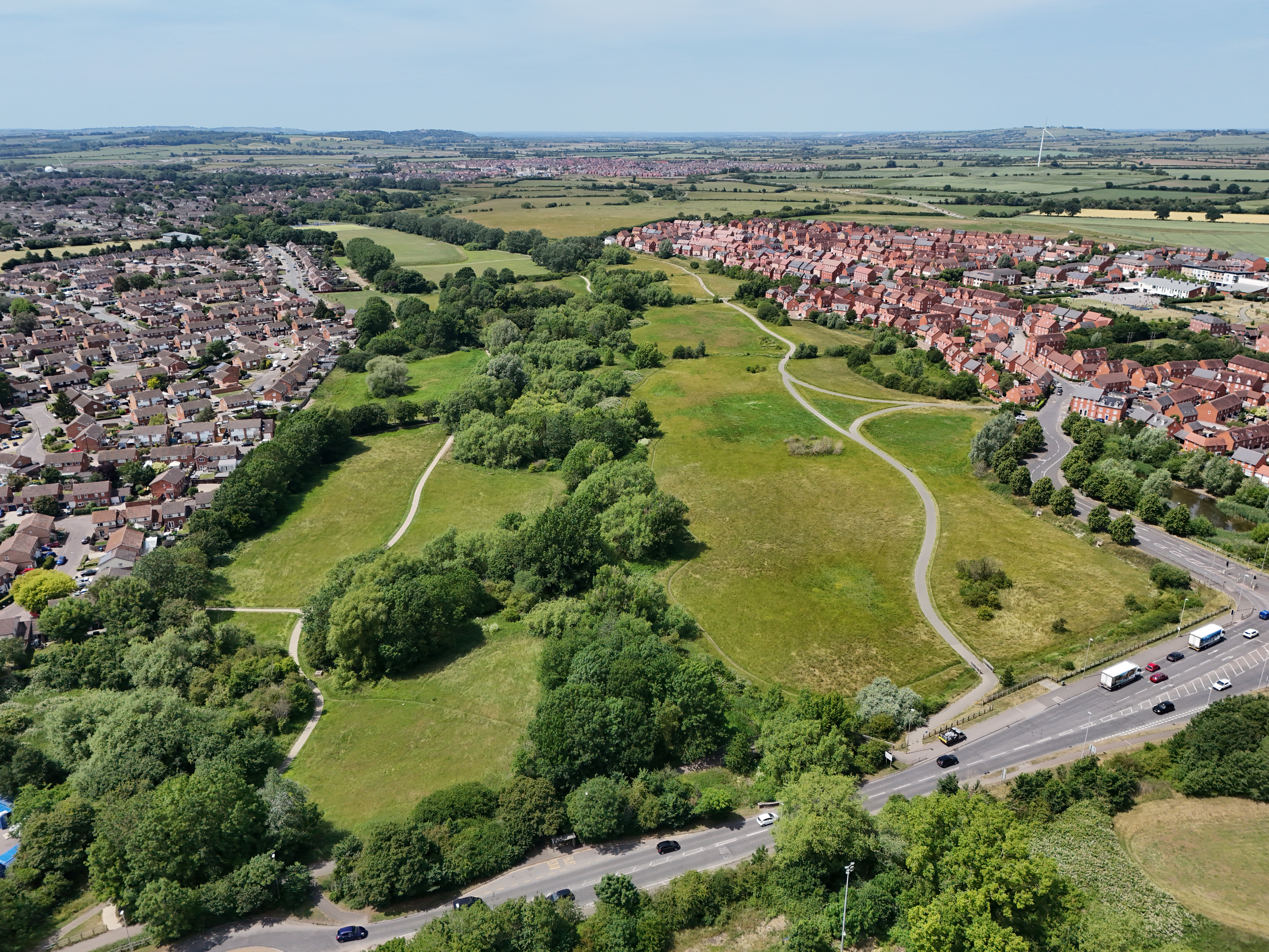 Buckingham Park on the 10 June 25. Before the heatwave the surrounding fields are very green.