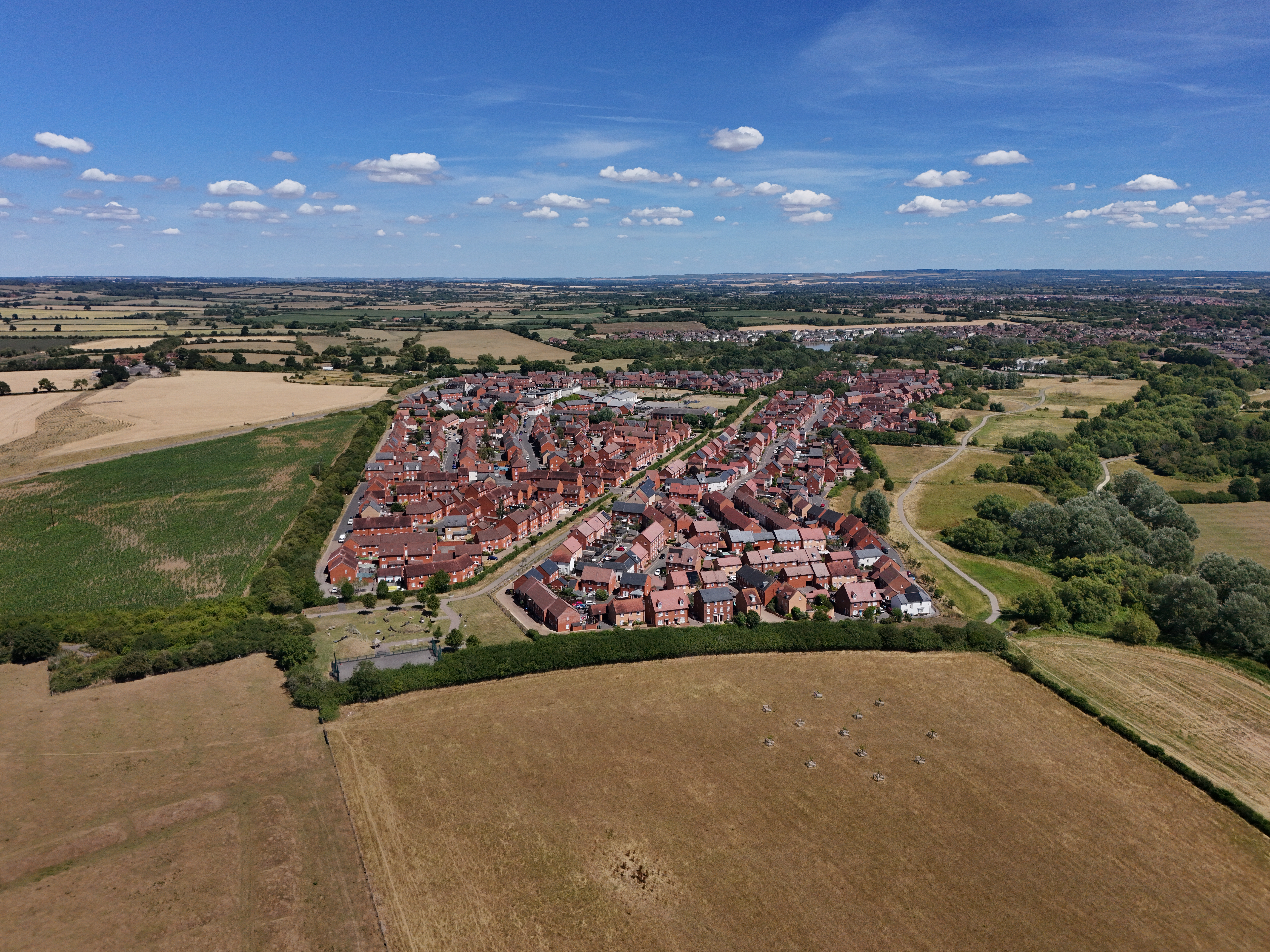 Buckingham Park estate on the 10 Jul 25. Notice the dark fields that are no longer bright green.