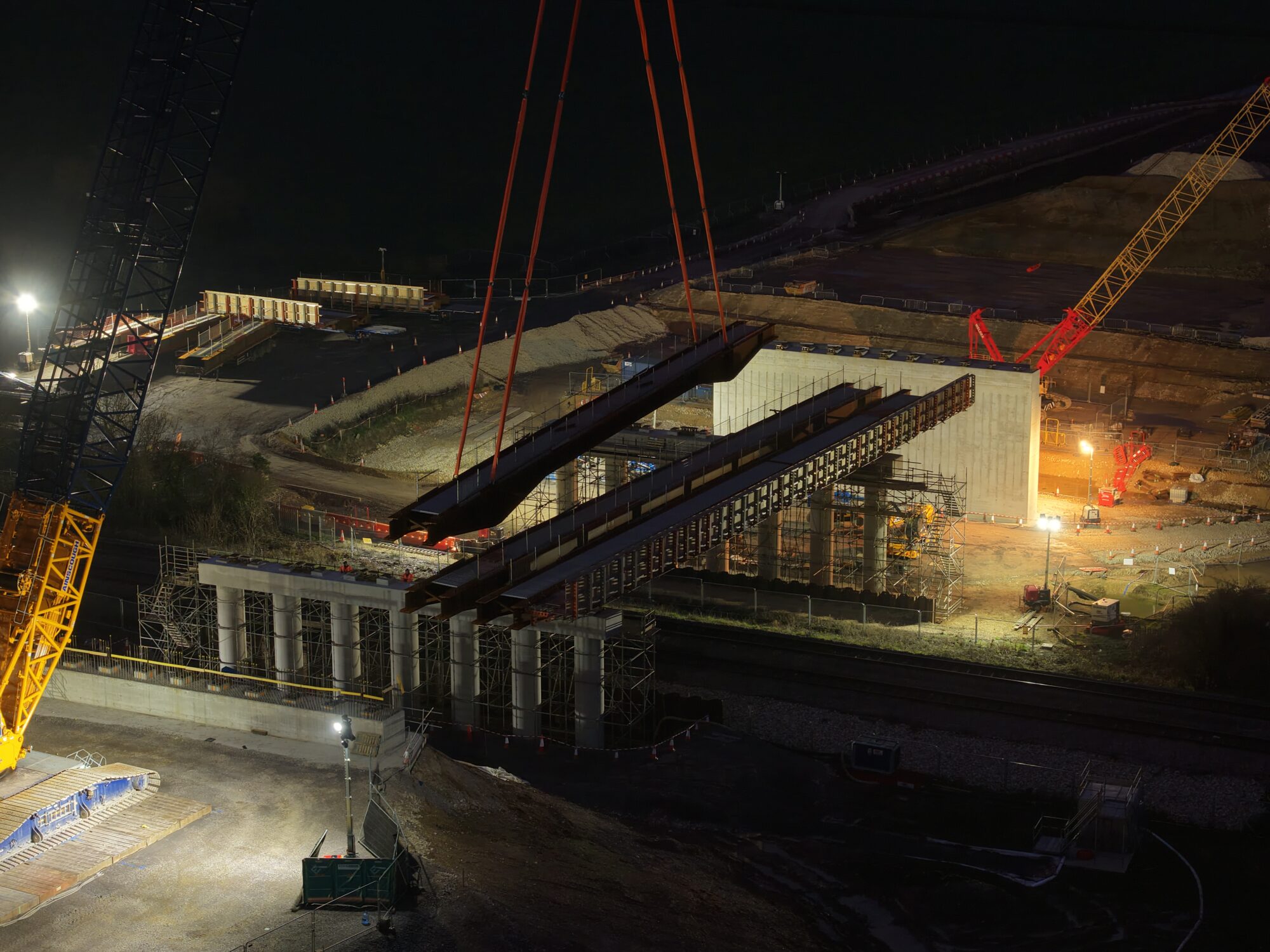 Enlarged. The third main span on the SEALR railway bridge is being moved next to the previous two that were placed from 1830 on Christmas DAy.