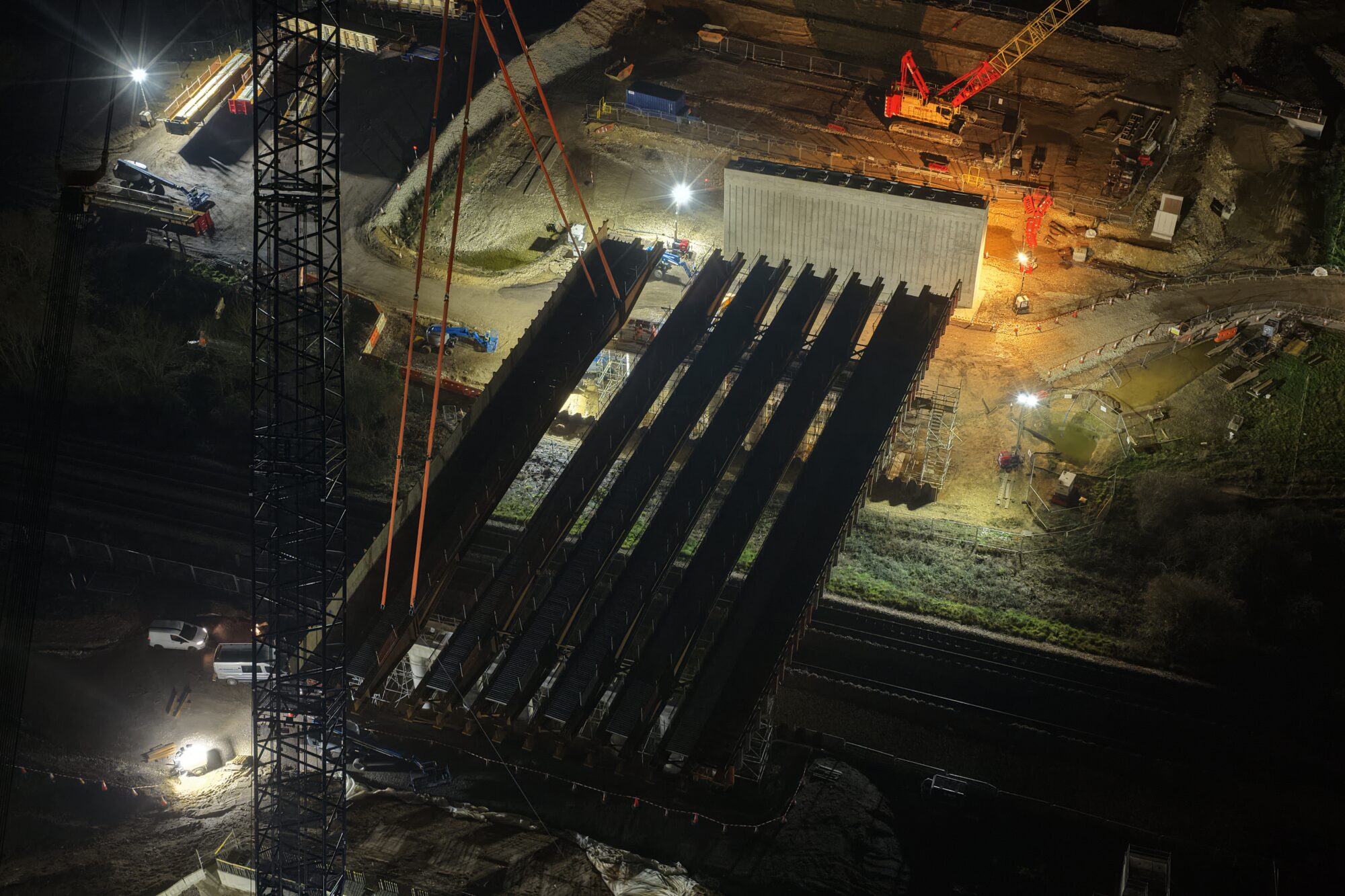 the 6th and final large SEALR bridge beam is lowered into position.