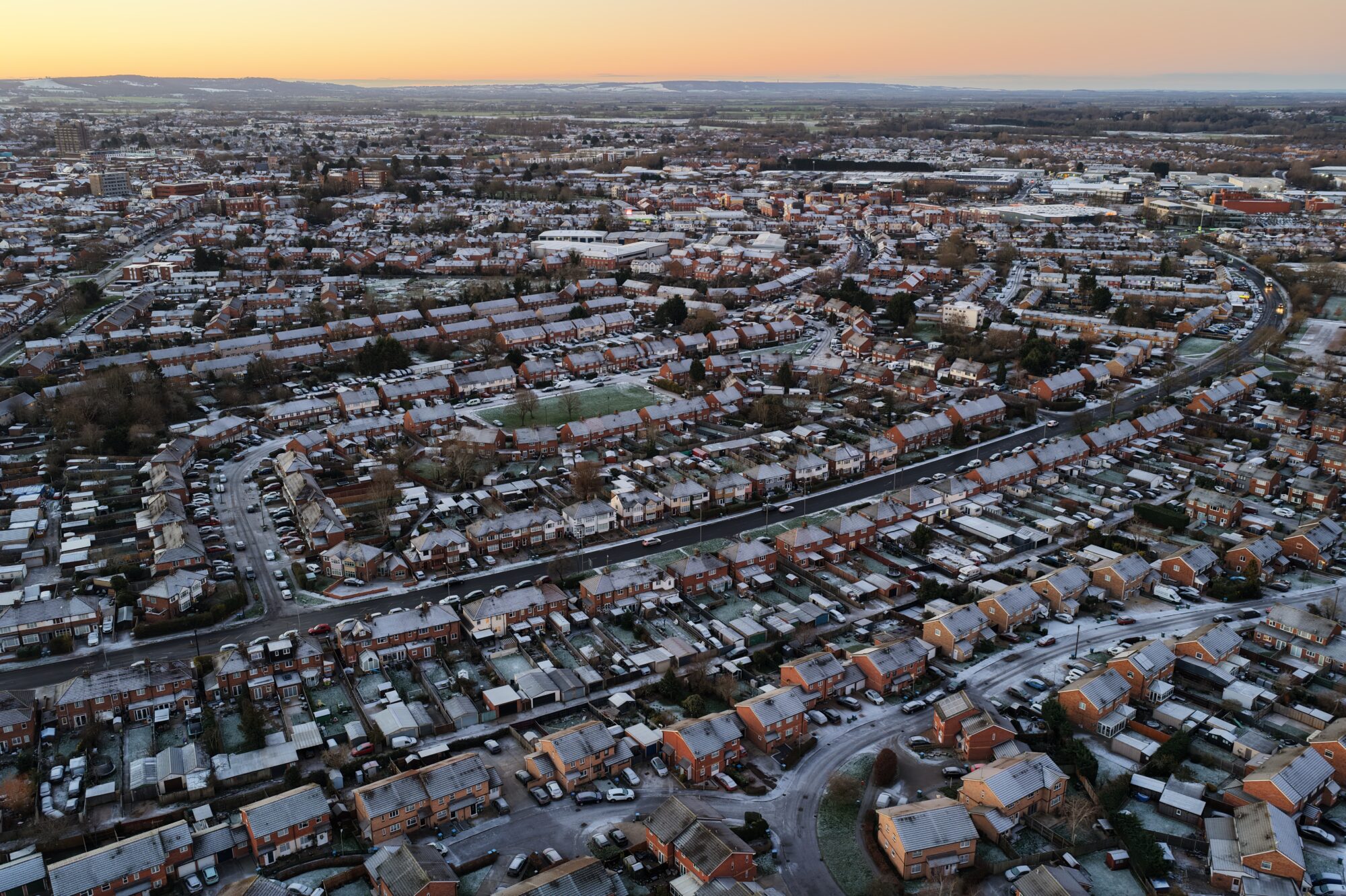 Aerial photograph of a frost covered housing estate in Aylesbury. Taken by a drone from Sky Eye Imagery. The Aylesbury drone service.